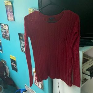 Women’s red sweater with zipper details
